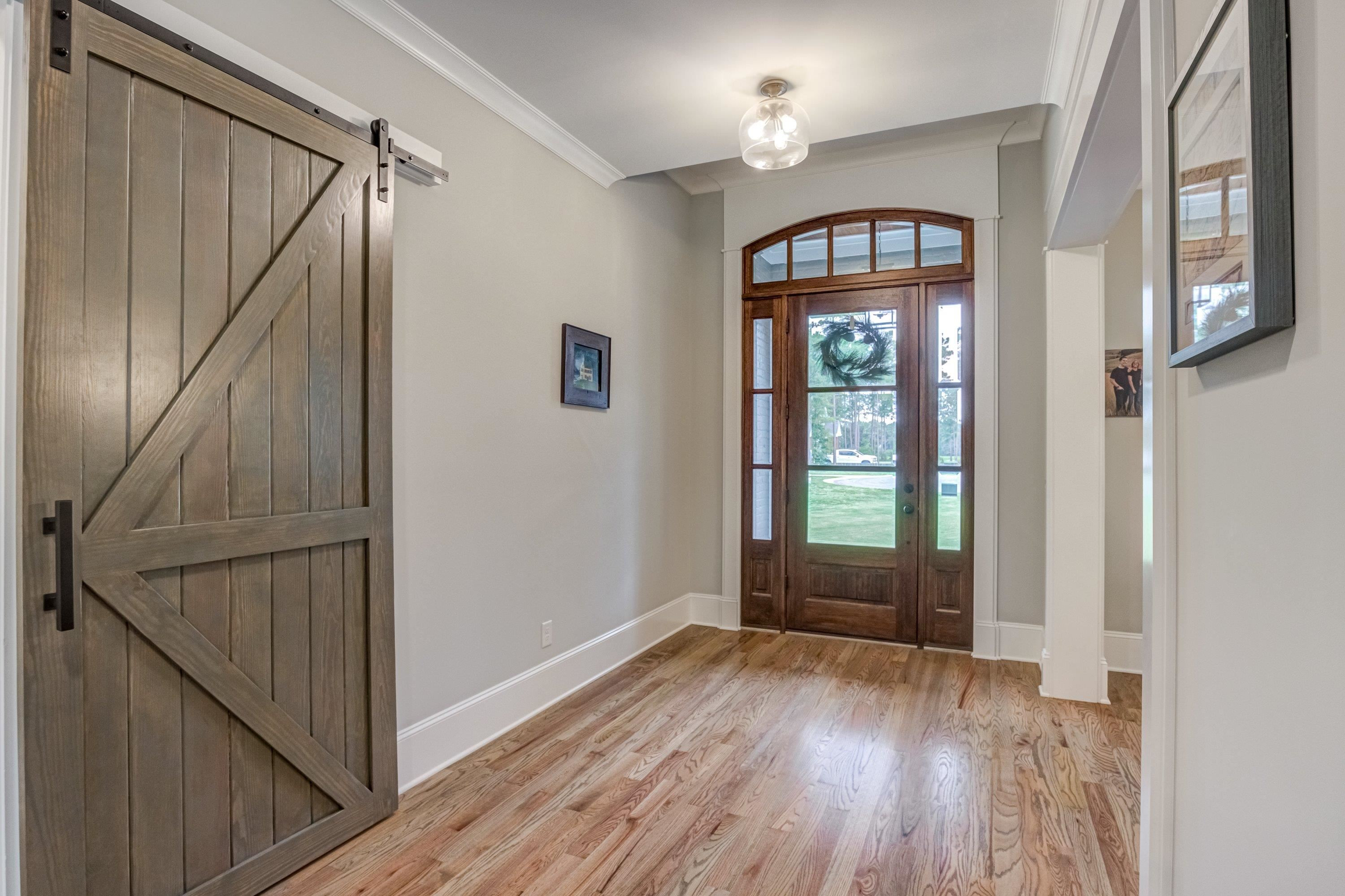 109 Independence Drive Smithfield, NC 27577 - Photo 4 of 36 a view of entryway with wooden floor
