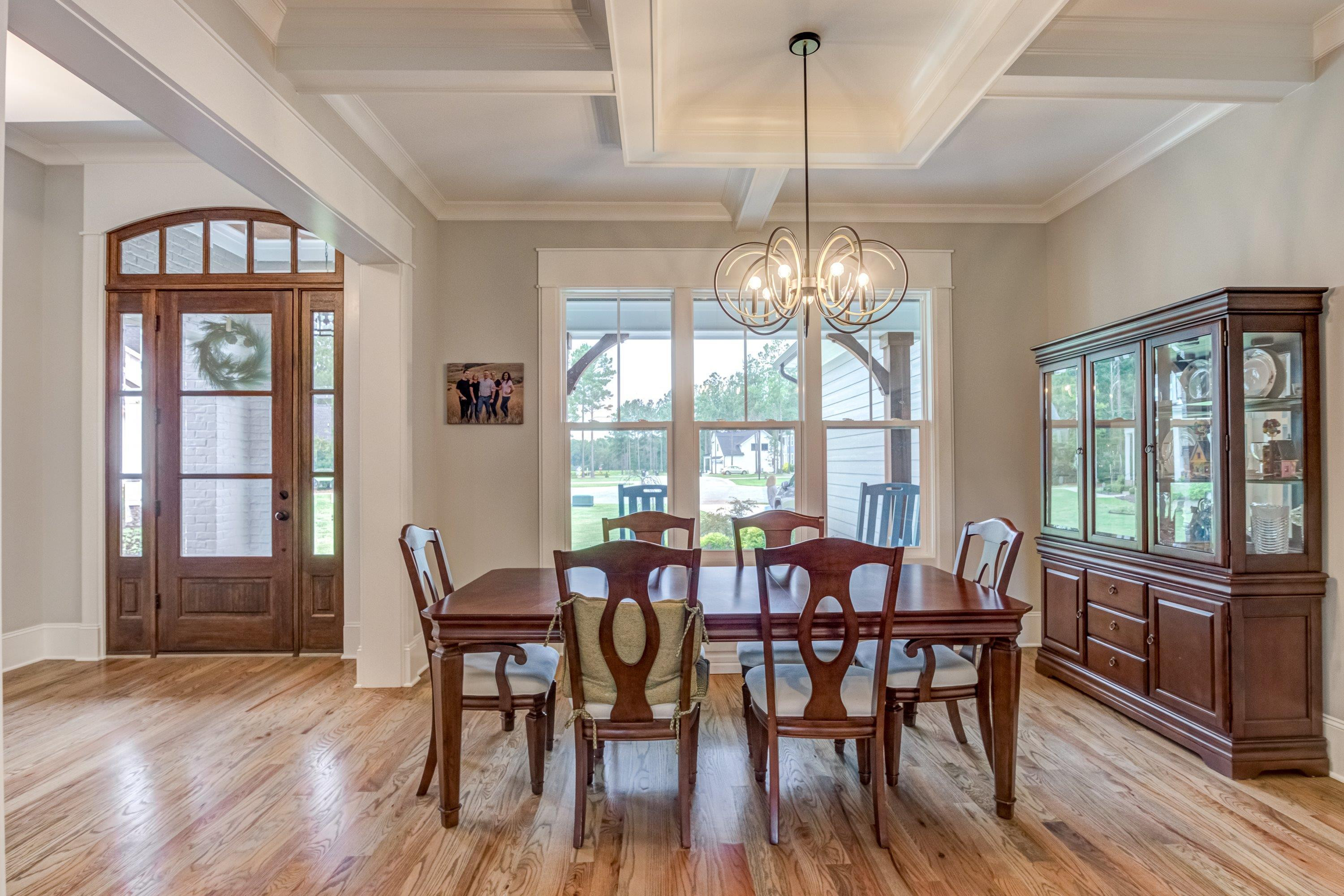 109 Independence Drive Smithfield, NC 27577 - Photo 5 of 36 a view of a dining room with furniture window and wooden floor