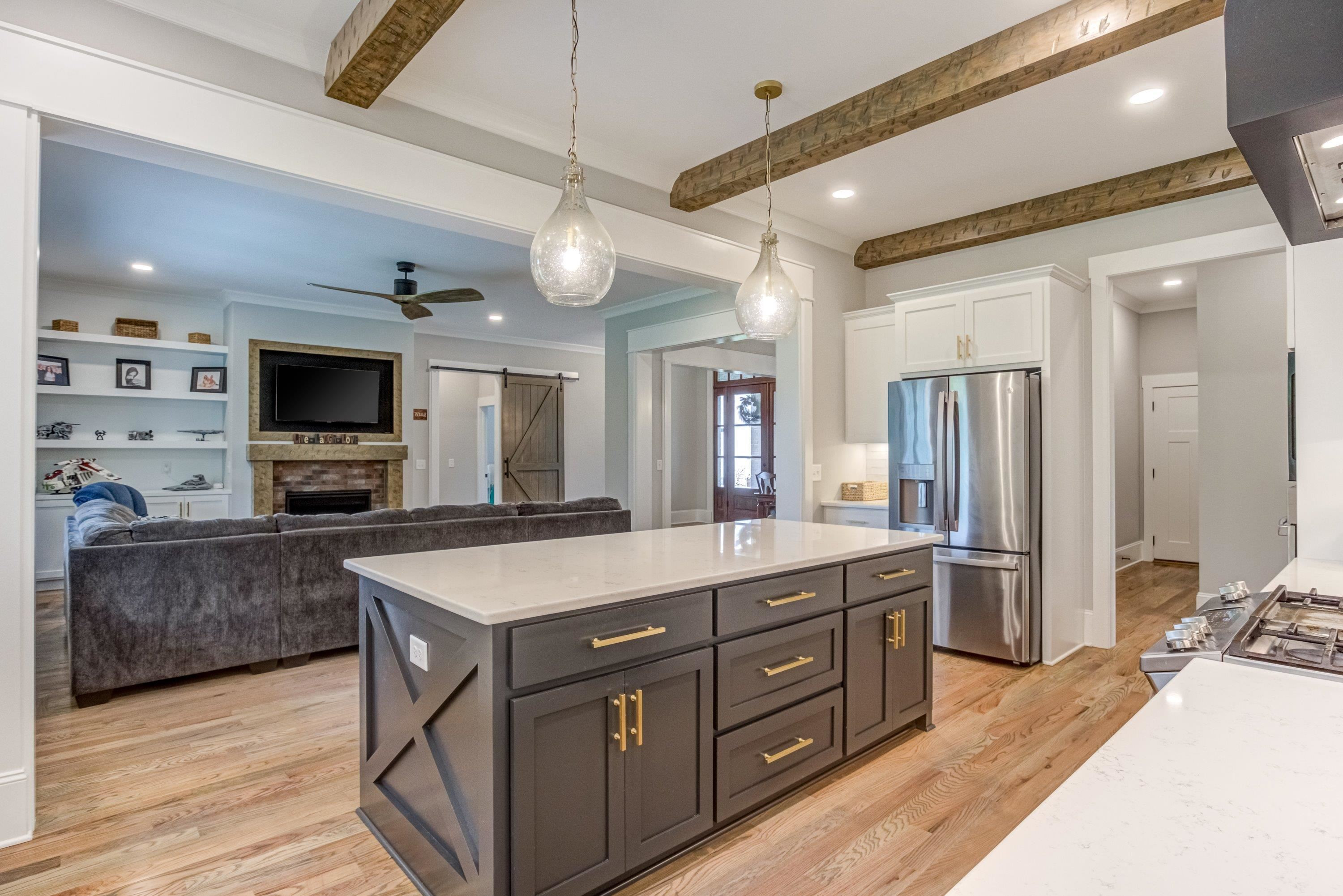 109 Independence Drive Smithfield, NC 27577 - Photo 10 of 36 a large kitchen with stainless steel appliances a large center island and a sink