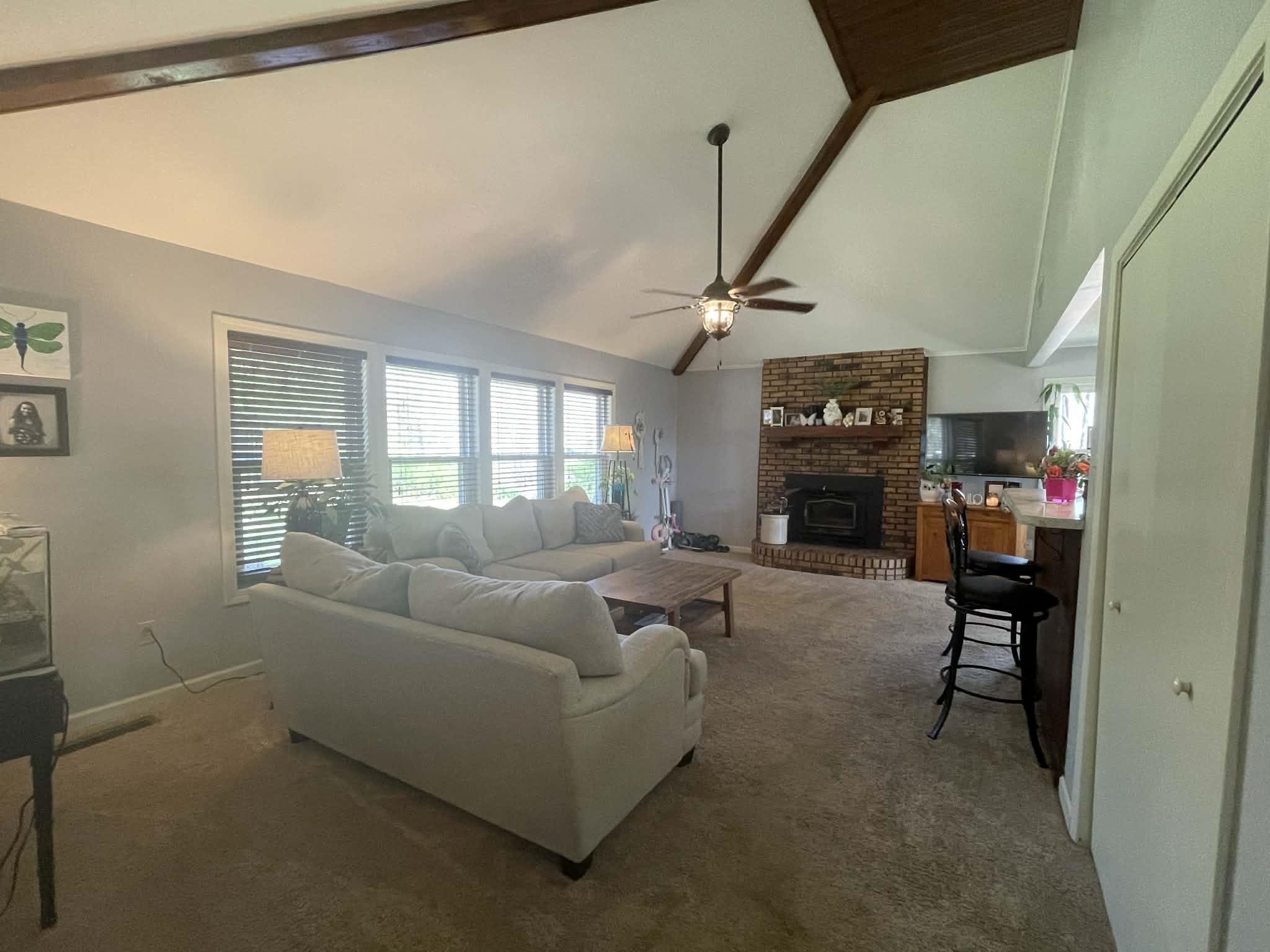 1655 Country Club Road Somerville, TN 38068 - Photo 4 of 26 a living room with furniture and a fireplace