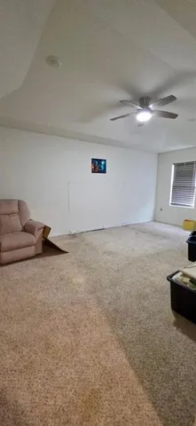 a view of livingroom and workspace