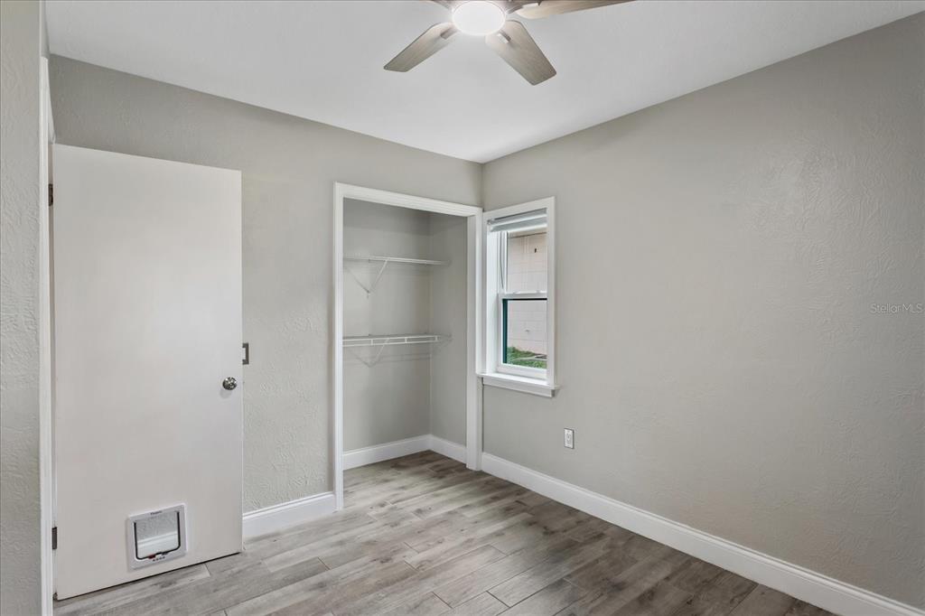 916 Timor Avenue Orlando, FL 32804 - Photo 18 of 60 an empty room with windows and closet