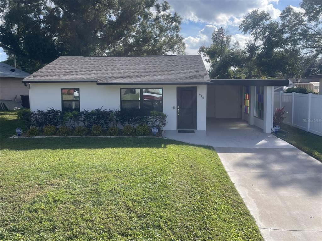 916 Timor Avenue Orlando, FL 32804 - Photo 44 of 60 a front view of house with yard and trees