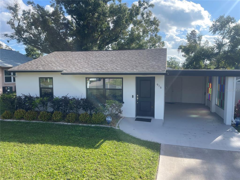 916 Timor Avenue Orlando, FL 32804 - Photo 47 of 60 a house view with a garden space