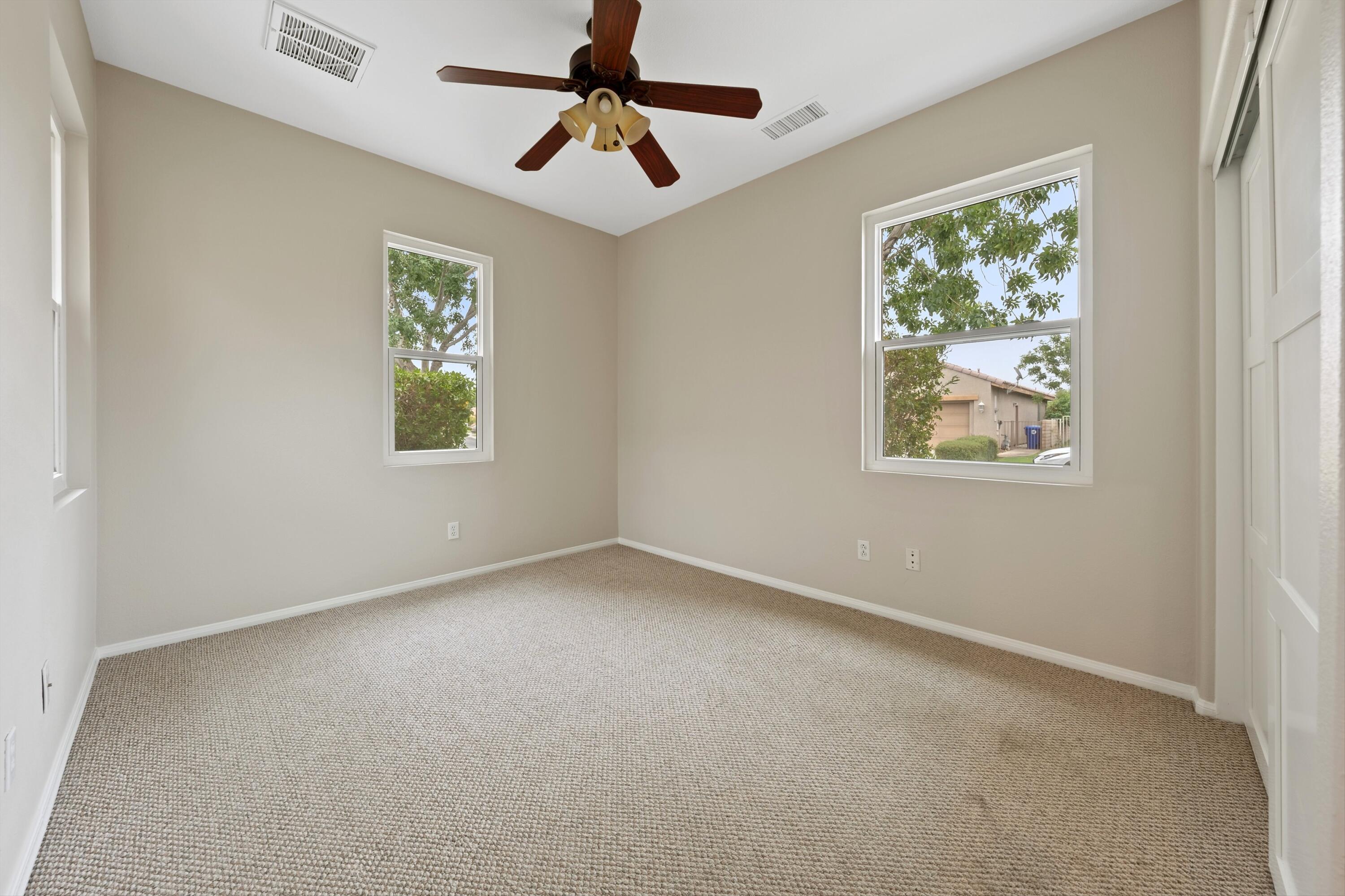 49335 Douglas Street Indio, CA 92201 - Photo 29 of 31 a view of an empty room with a window