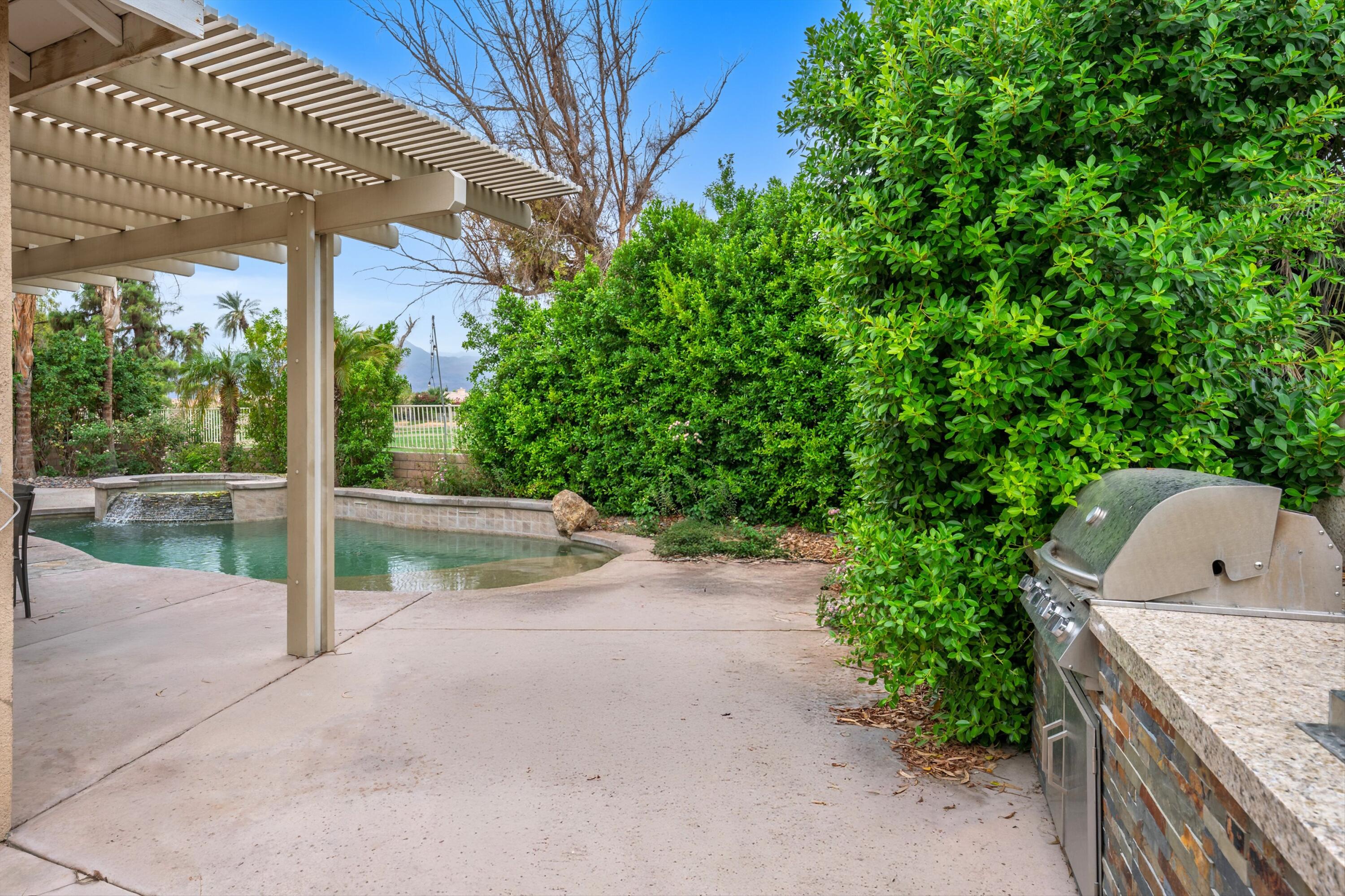 49335 Douglas Street Indio, CA 92201 - Photo 6 of 31 a view of a porch with backyard