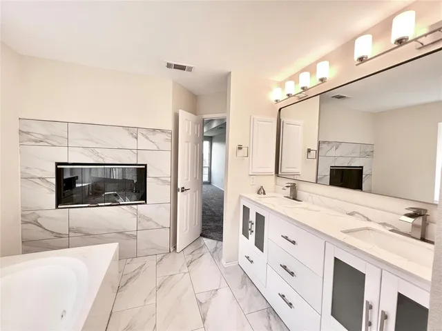 a view of a livingroom with a flat screen tv