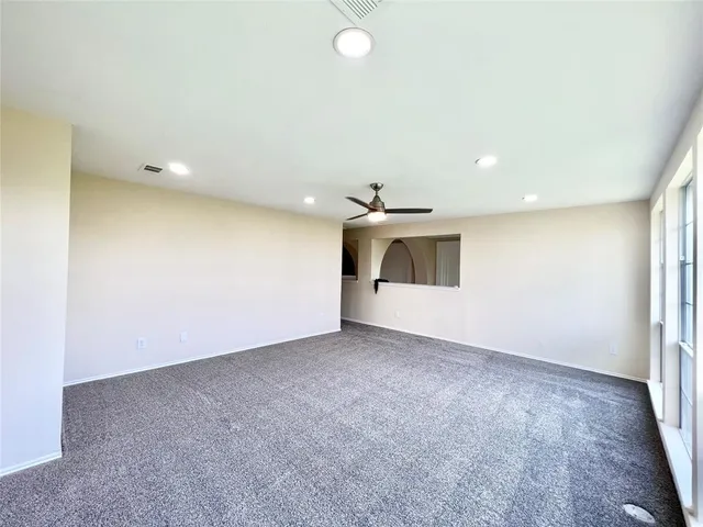 a bathroom with a granite countertop sink mirror and