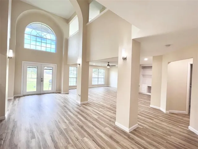 a view of livingroom with hardwood floor and hallway