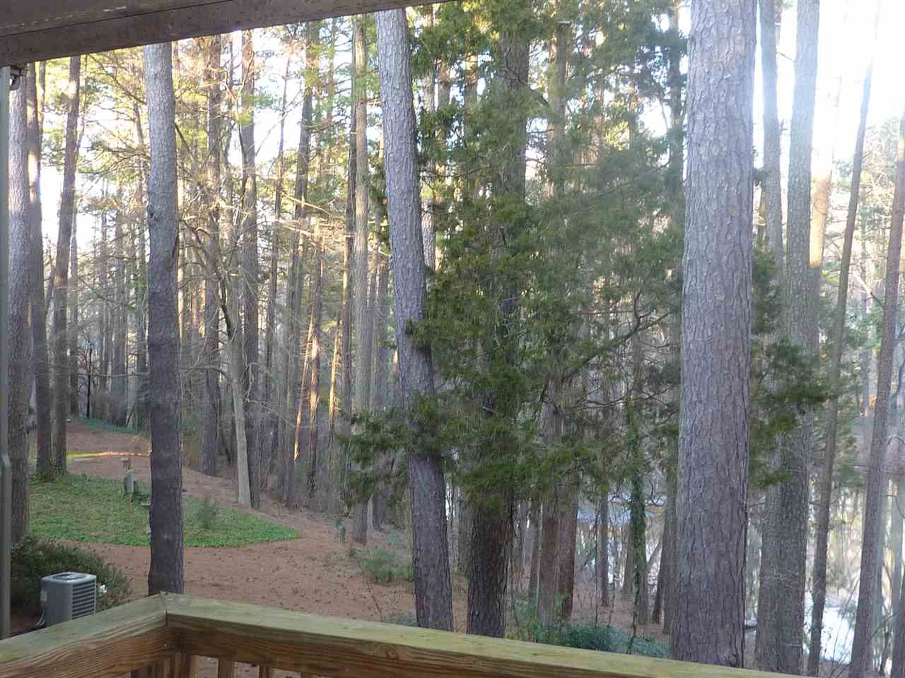 683 Pine Ridge Place, Unit 683 Raleigh, NC 27609 - Photo 4 of 12 Sip your coffee, read the paper or just enjoy the beautiful scene. Exterior Back