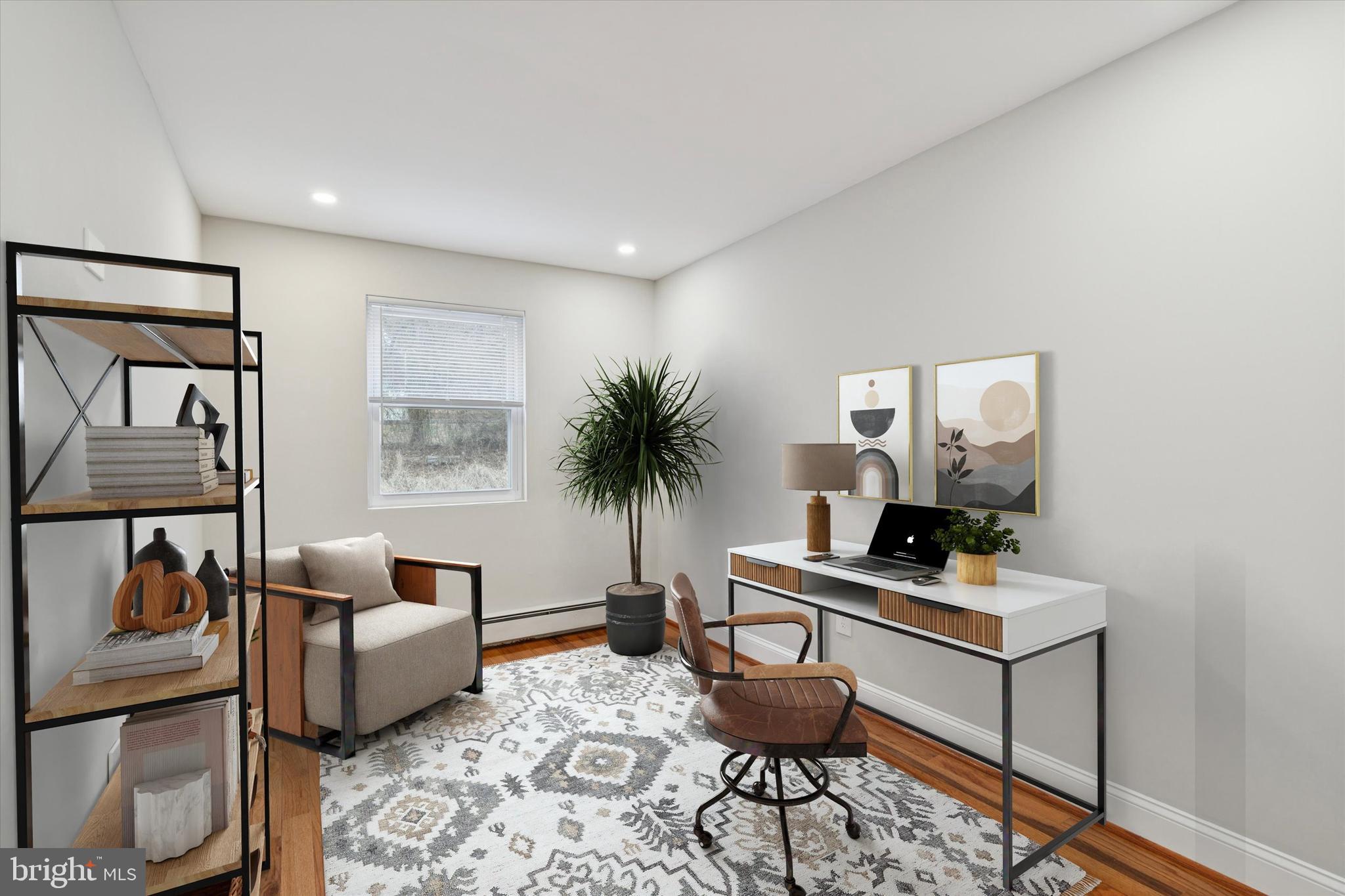 508 Stidman Drive, Unit C1 Springfield, PA 19064 - Photo 18 of 21 a living room with furniture and a window
