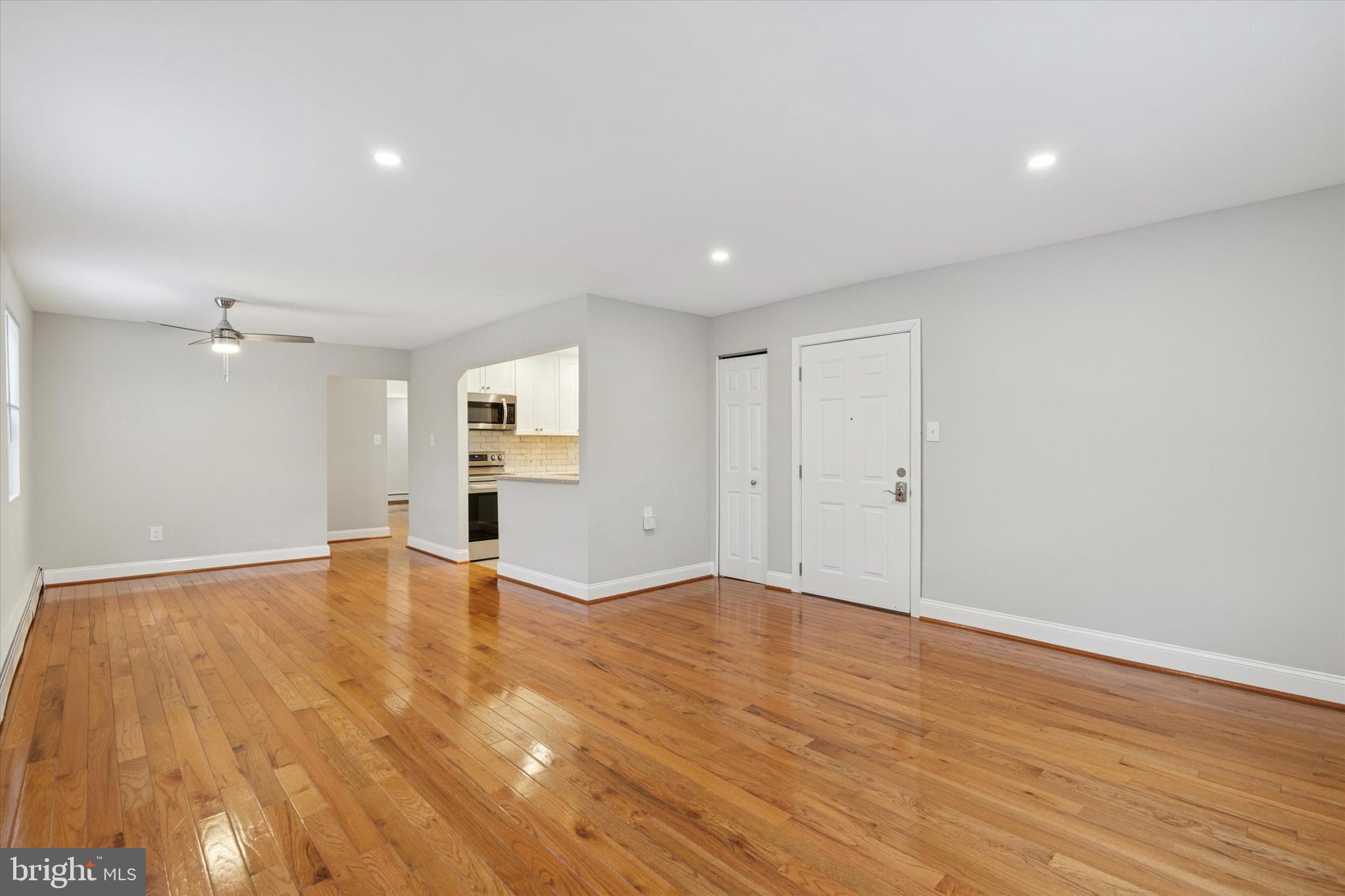 508 Stidman Drive, Unit C1 Springfield, PA 19064 - Photo 3 of 21 wooden floor in an empty room with a window