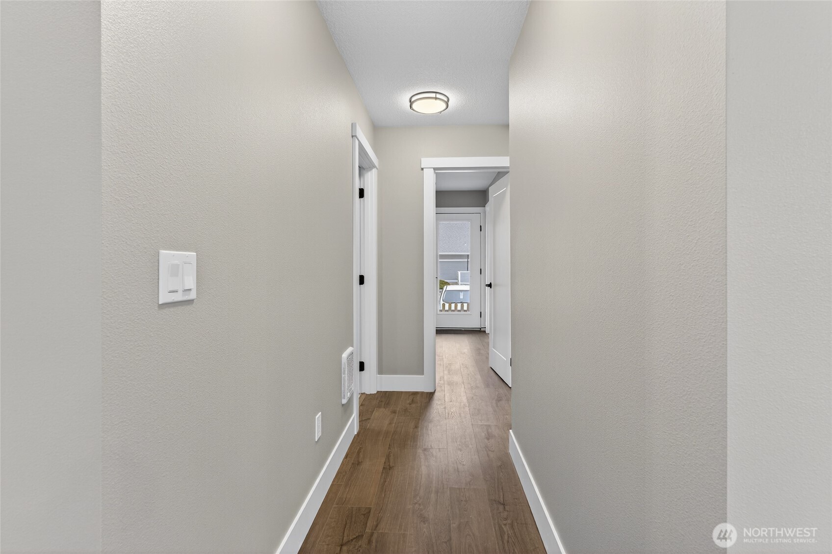 111 7th Street Southwest Long Beach, WA 98631 - Photo 14 of 30 a view of a room with wooden floor