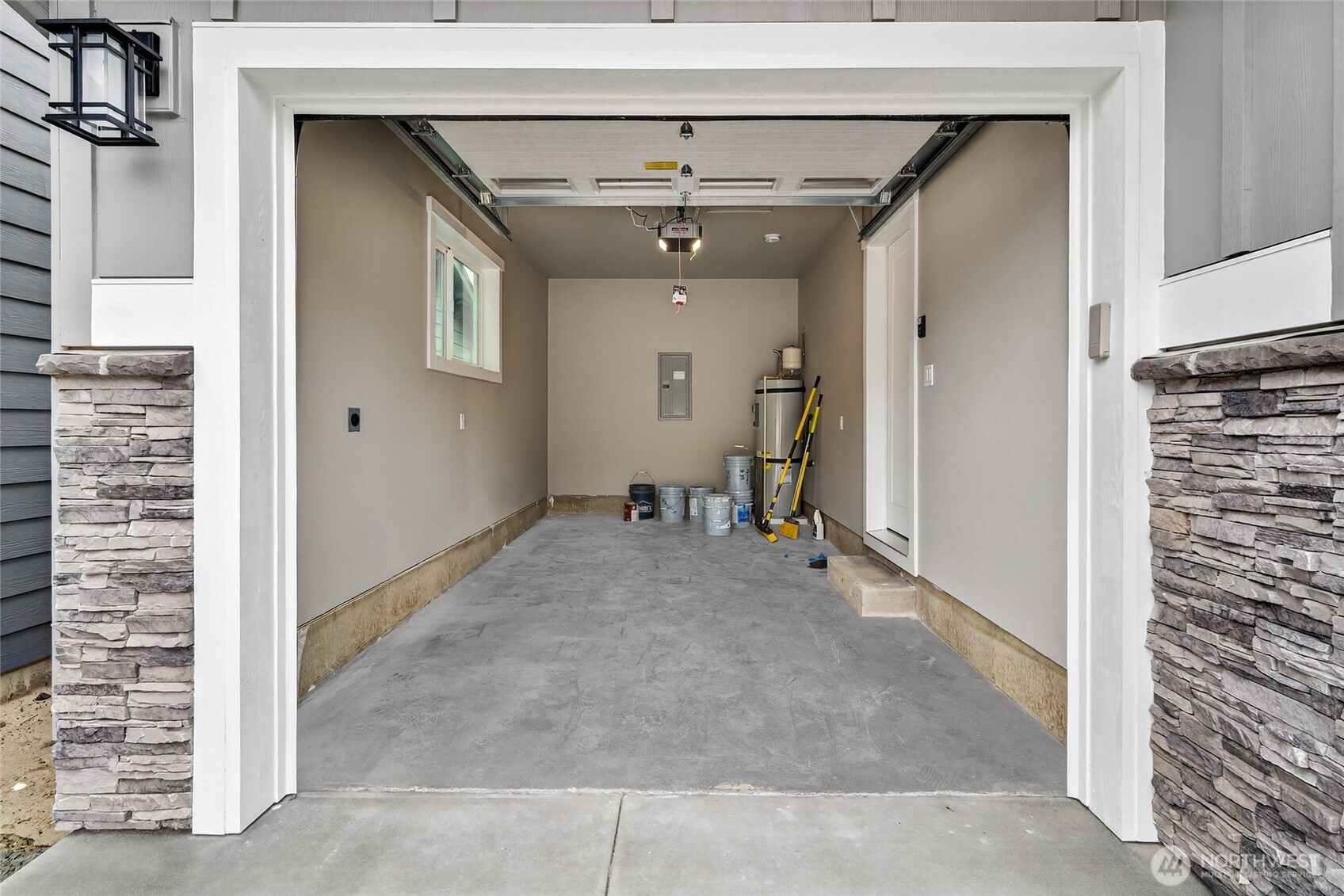 111 7th Street Southwest Long Beach, WA 98631 - Photo 4 of 30 a view of a hallway with a white door and stairs