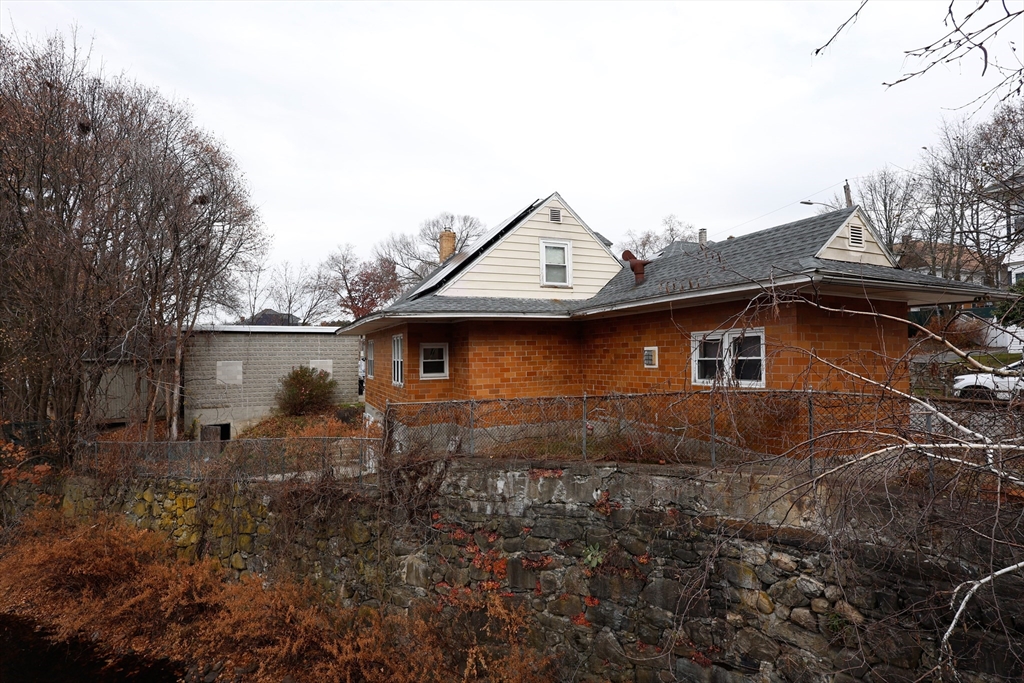 2 Horne Street Methuen, MA 01844 - Photo 10 of 11 a backyard of a house with lots of green space