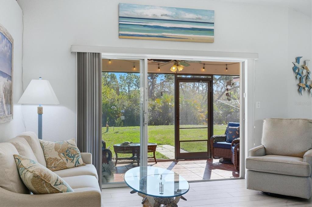 4036 Elvington Road Port Charlotte, FL 33981 - Photo 15 of 29 a living room with furniture and a large window