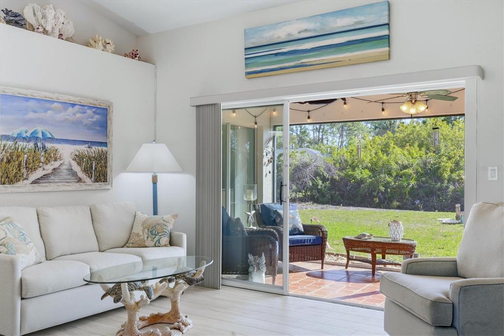 4036 Elvington Road Port Charlotte, FL 33981 - Photo 16 of 29 a living room with furniture and a large window