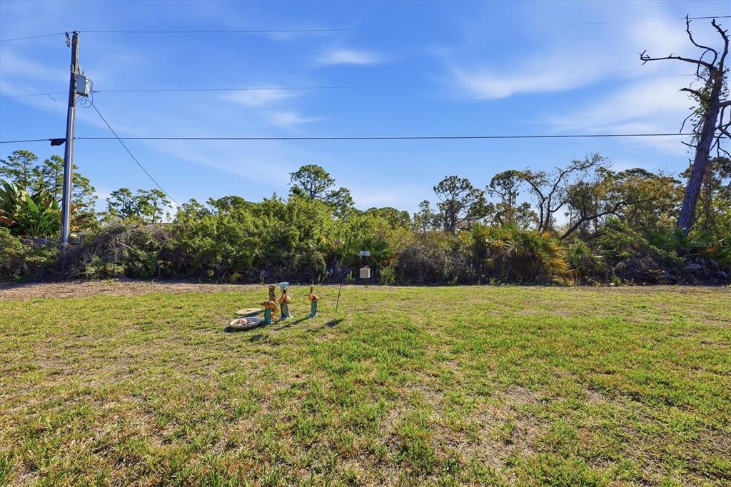4036 Elvington Road Port Charlotte, FL 33981 - Photo 26 of 29 a house view with outdoor space