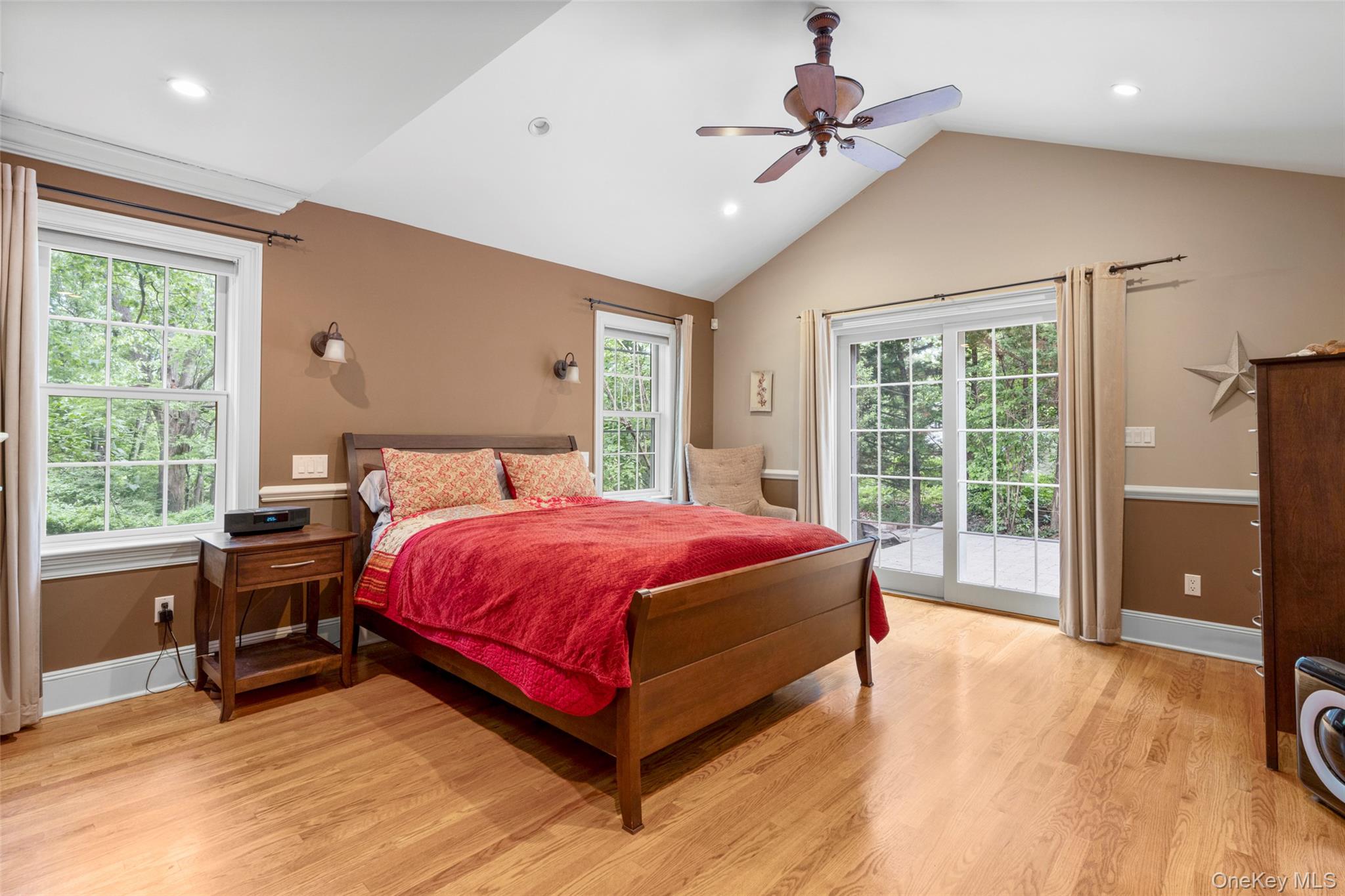 32 Country Road Mamaroneck, NY 10543 - Photo 10 of 35 Large primary Bedroom with doors to patio