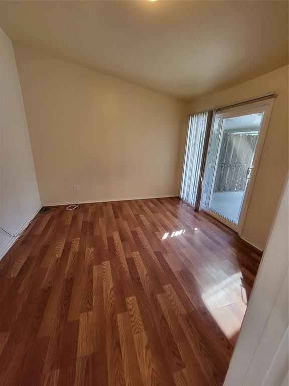 6900 Skillman Street, Unit 111 Dallas, TX 75231 - Photo 11 of 25 a view of an empty room and window