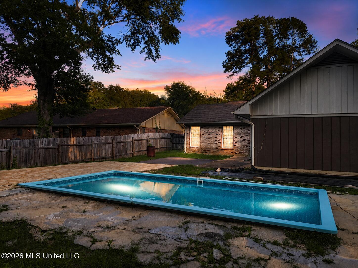1609 Melrose Place Clinton, MS 39056 - Photo 4 of 39 Pool Twilight