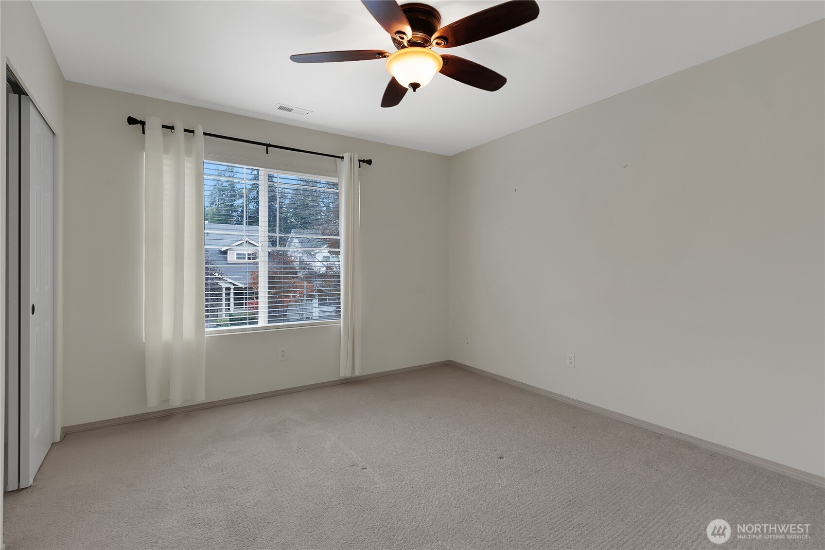1285 Griggs Street DuPont, WA 98327 - Photo 21 of 23 a view of an empty room with a window
