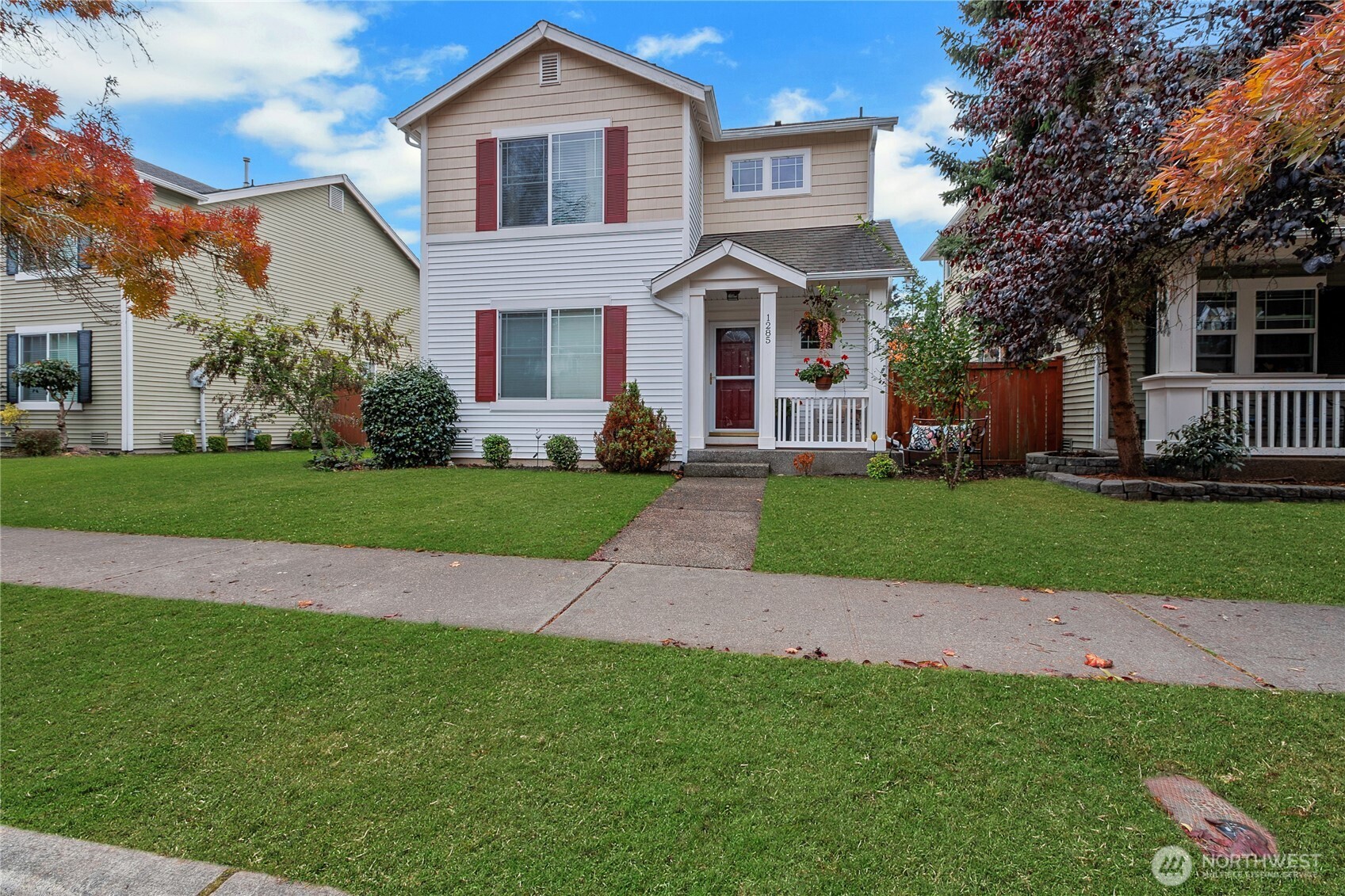 1285 Griggs Street DuPont, WA 98327 - Photo 3 of 23 a front view of a house with a yard