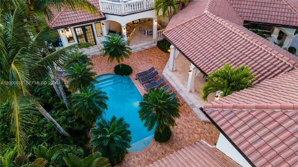a view of a house with a swimming pool