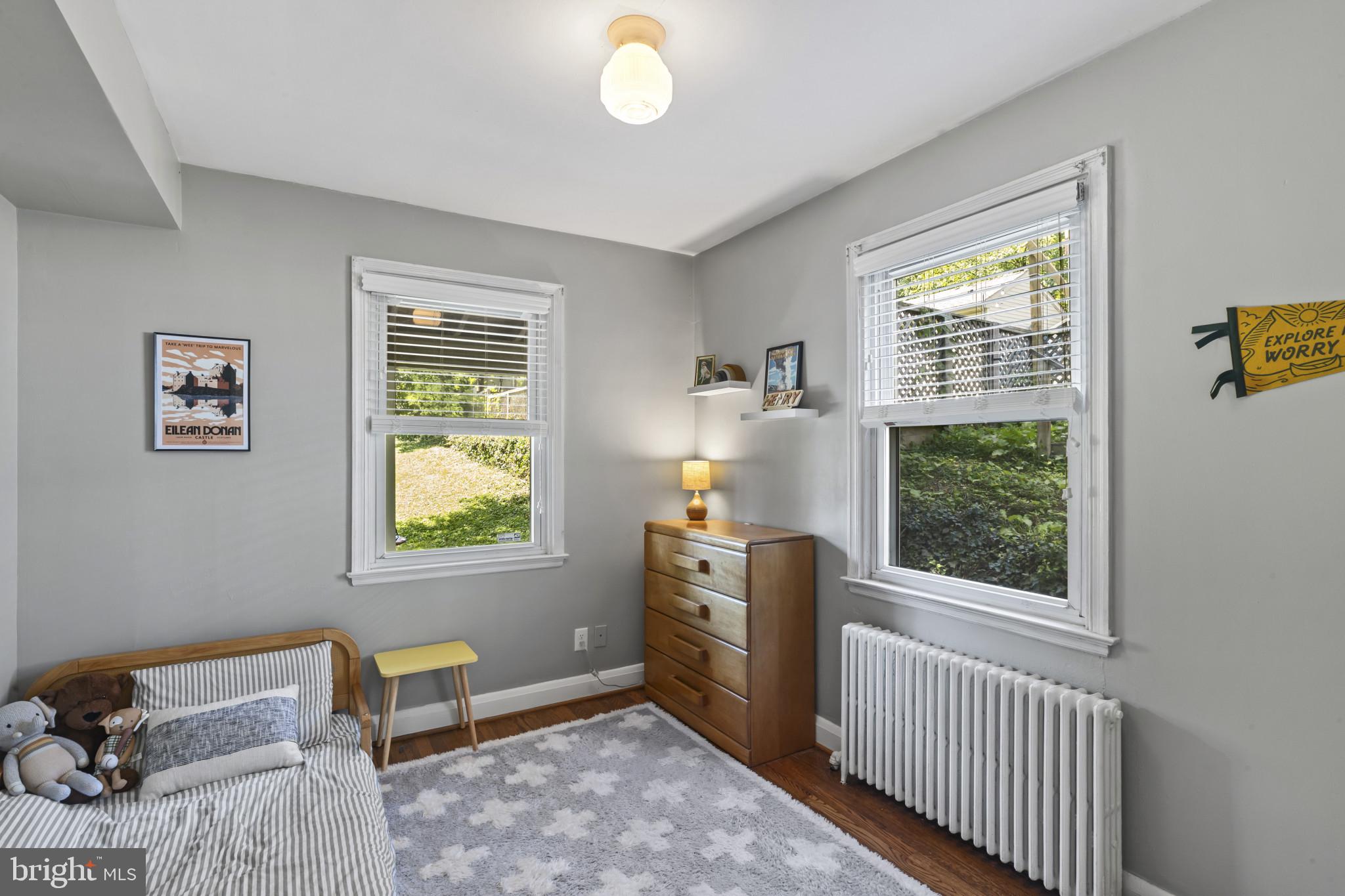 6500 Sharon Road Baltimore, MD 21239 - Photo 15 of 33 a bedroom with furniture and a window
