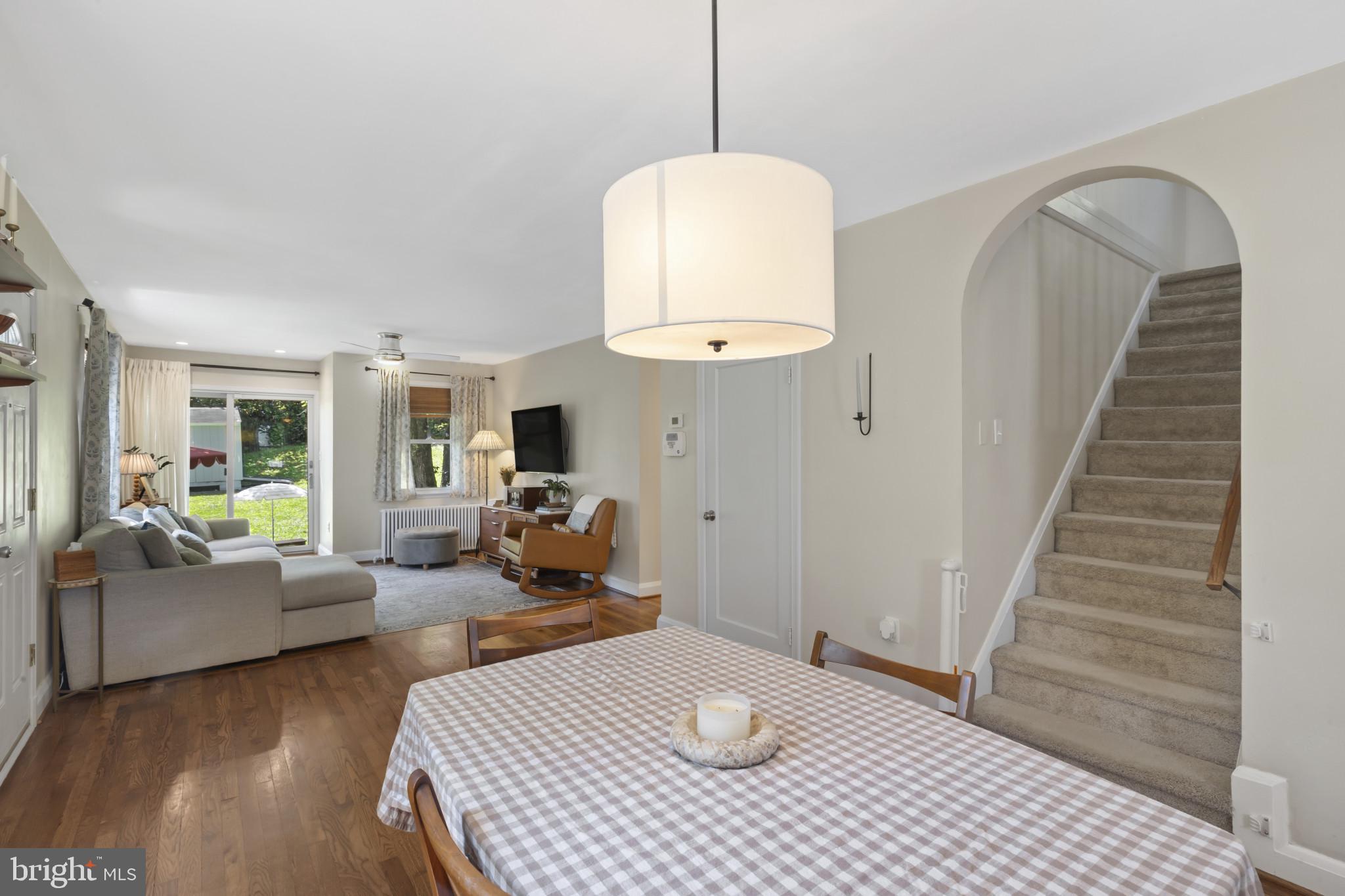 6500 Sharon Road Baltimore, MD 21239 - Photo 6 of 33 a bedroom with furniture and a chandelier