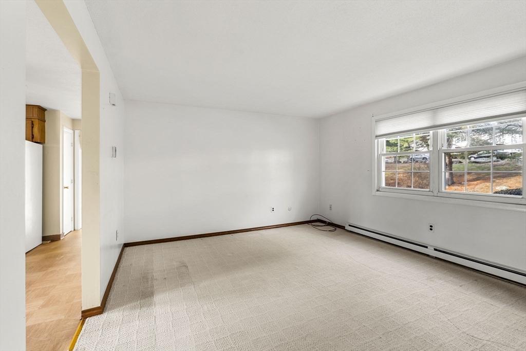 3 Wysocki Drive, Unit 6 Dudley, MA 01571 - Photo 16 of 24 a view of an empty room with a window