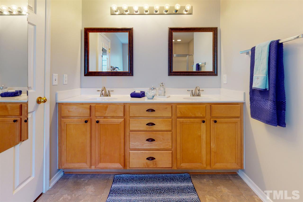8504 Slabstone Court Raleigh, NC 27613 - Photo 19 of 30 Garden tub, separate shower, water closet, dual vanities and a walk in closet.