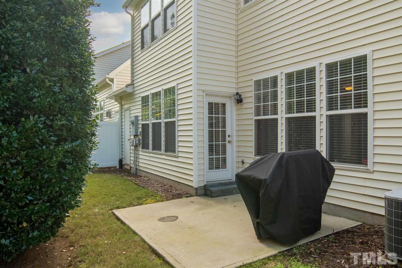 8504 Slabstone Court Raleigh, NC 27613 - Photo 28 of 30 Patio overlooks a wooded buffer
