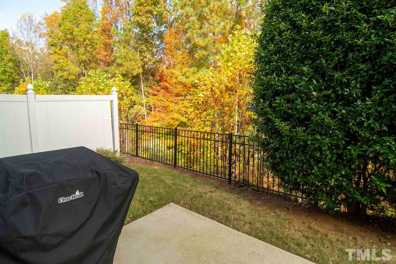 8504 Slabstone Court Raleigh, NC 27613 - Photo 29 of 30 Privacy on the patio that overlooks a wooded buffer