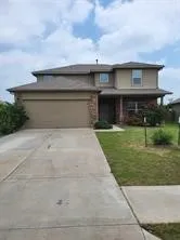 a front view of house with yard