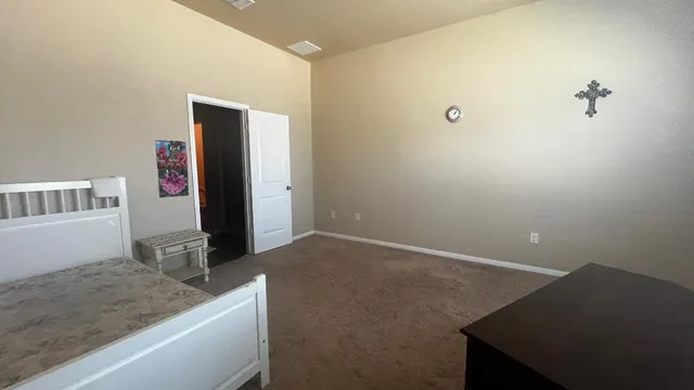 a bathroom with a sink toilet and mirror