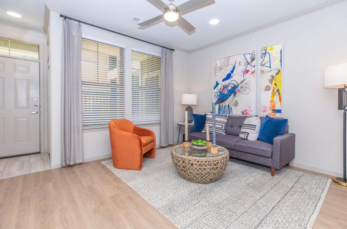 907 S Road, Unit 7202 Baytown, TX 77521 - Photo 7 of 12 a living room with furniture and a large window