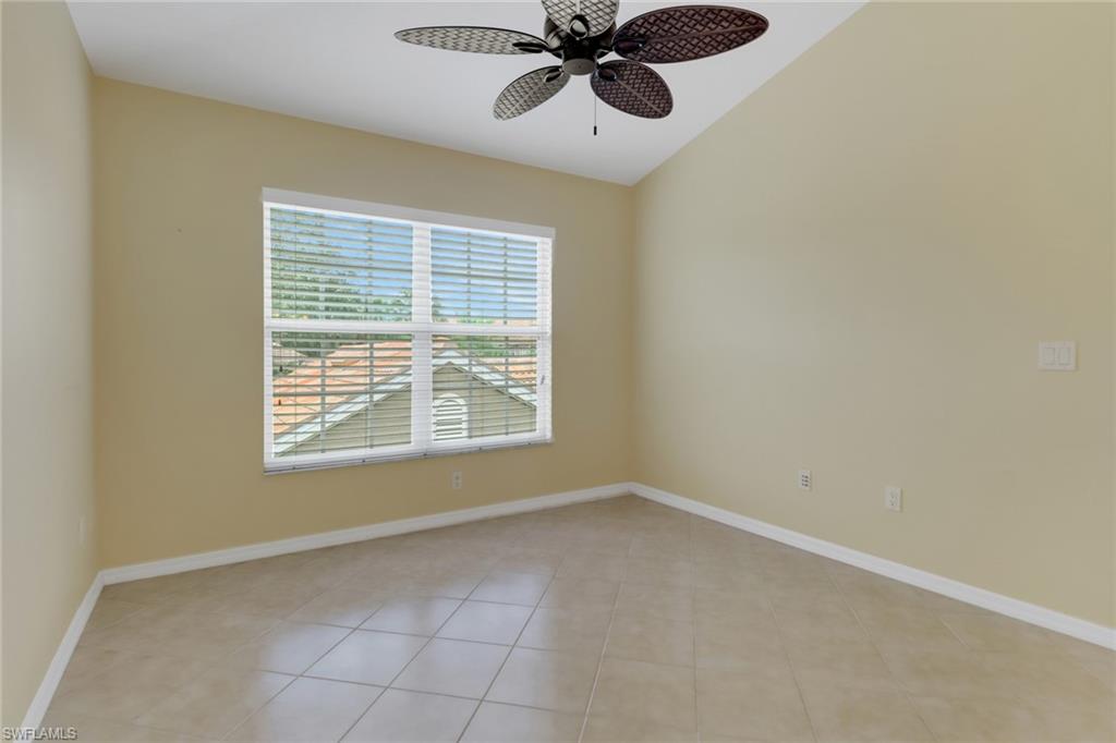 20141 Seagrove Street, Unit 308 Estero, FL 33928 - Photo 16 of 36 a view of an empty room with a window