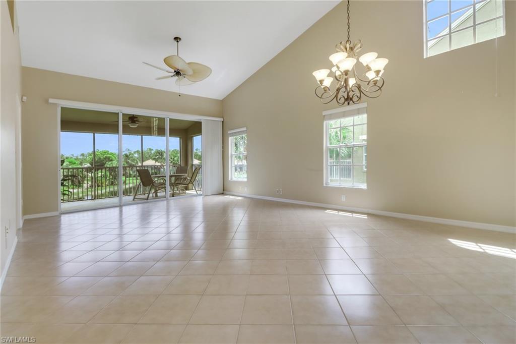 20141 Seagrove Street, Unit 308 Estero, FL 33928 - Photo 5 of 36 a view of an empty room with a window