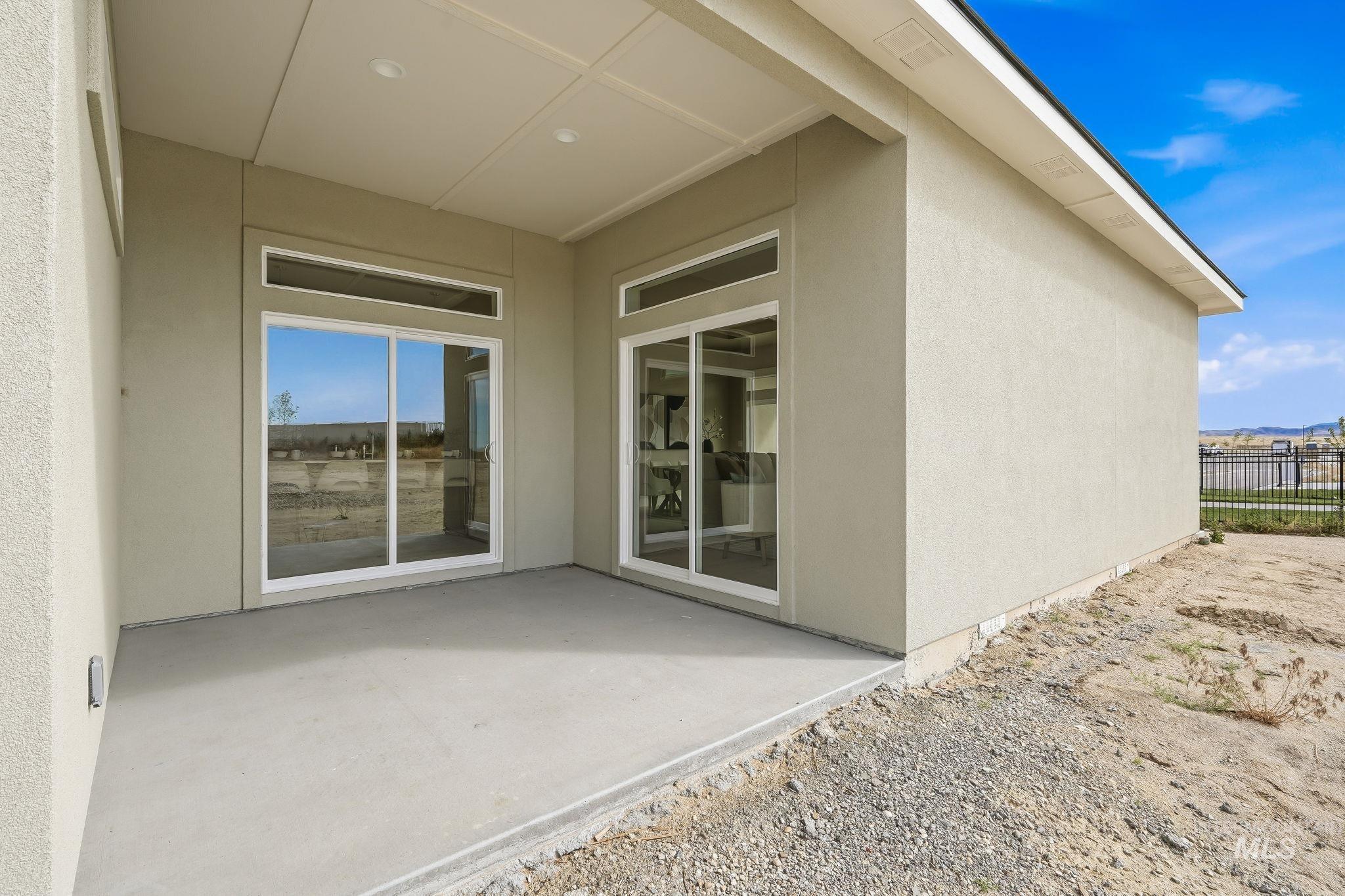 470 South Radiator Way Boise, ID 83716 - Photo 50 of 50 Covered patio with recessed lighting, concrete flooring, and direct access to interior spaces through two sliding glass doors with transom windows