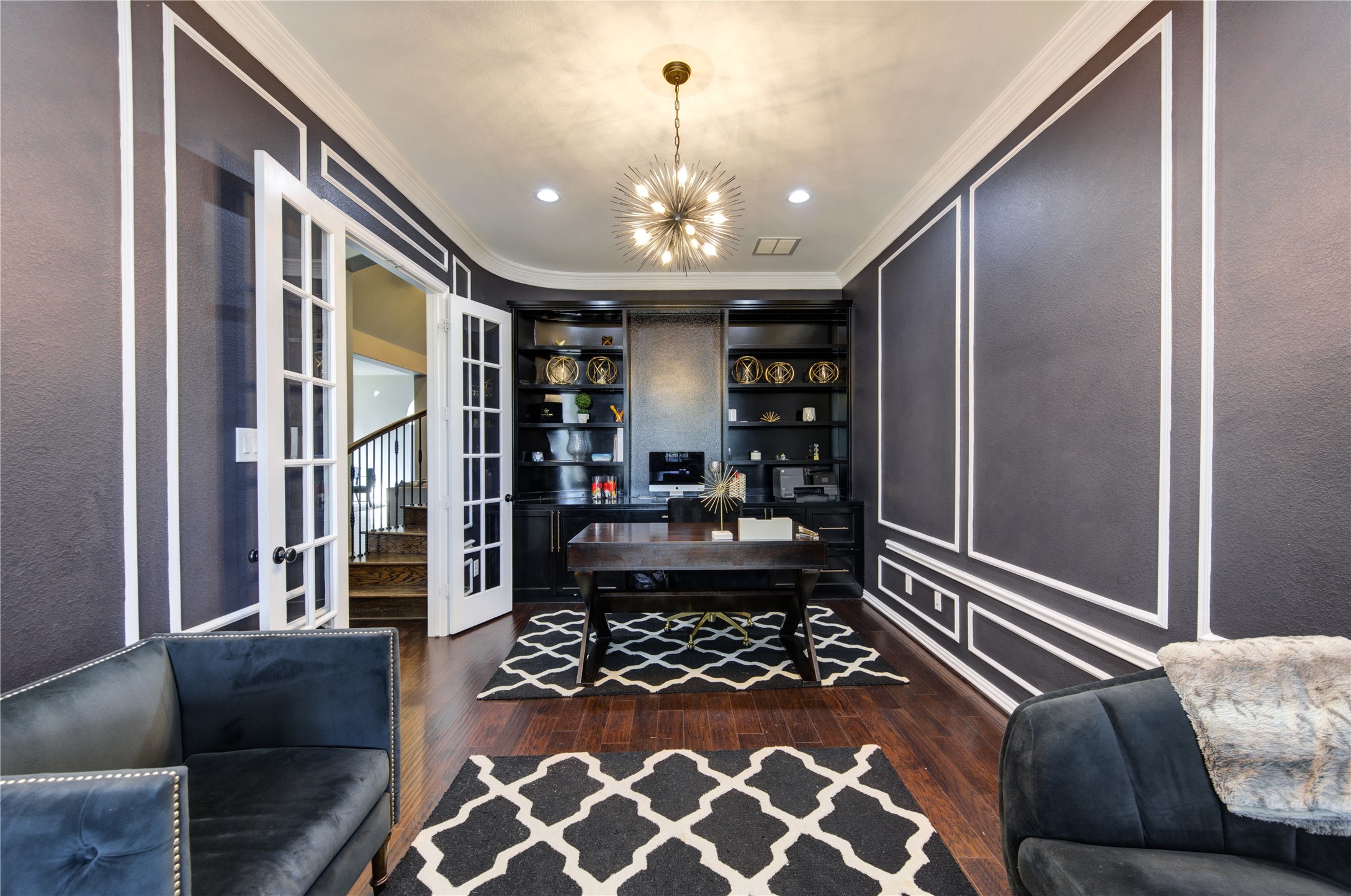 17539 Hankar Way Richmond, TX 77407 - Photo 12 of 34 a living room with furniture and a chandelier