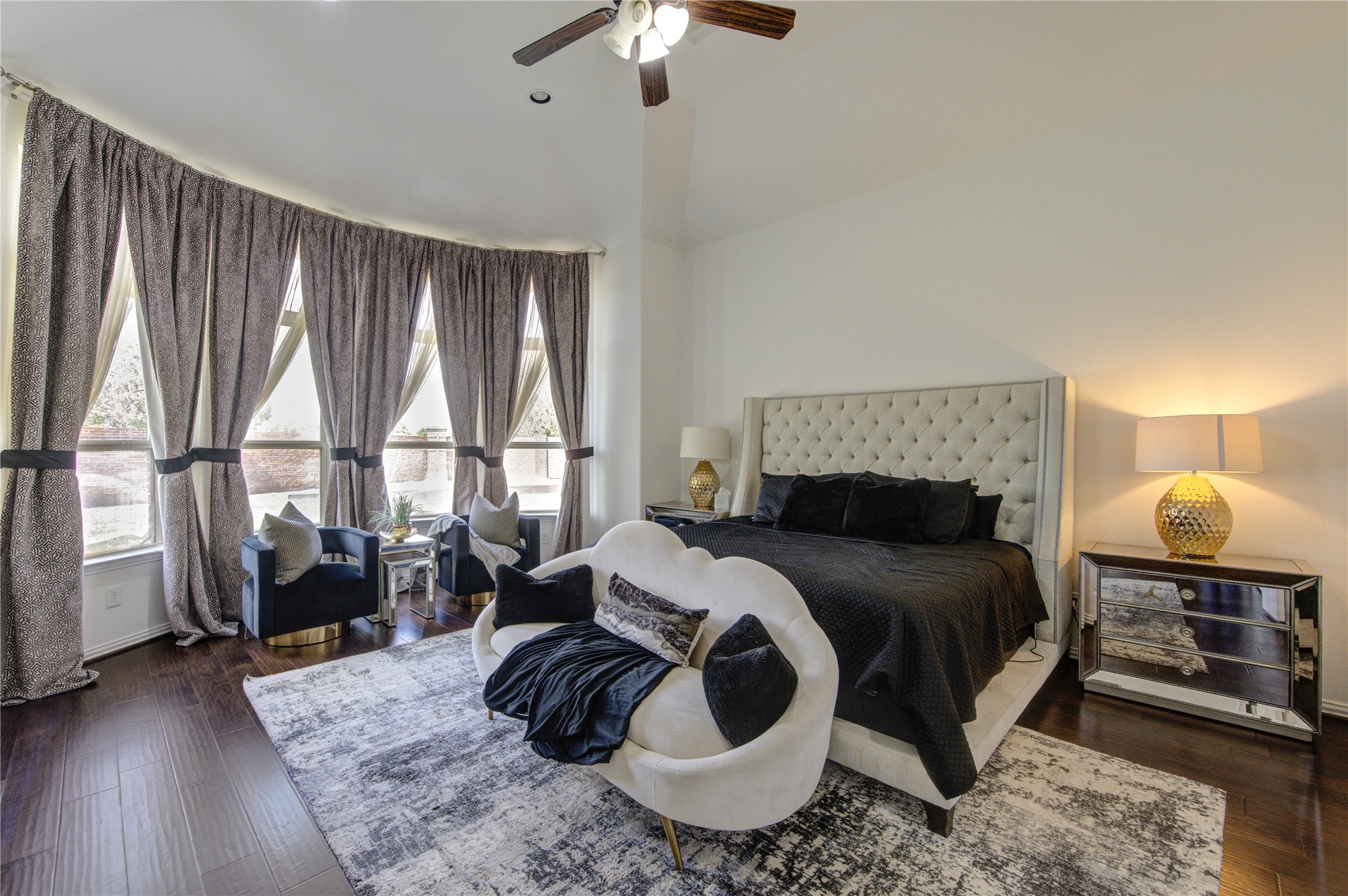 17539 Hankar Way Richmond, TX 77407 - Photo 15 of 34 a bedroom with a bed a window and couch