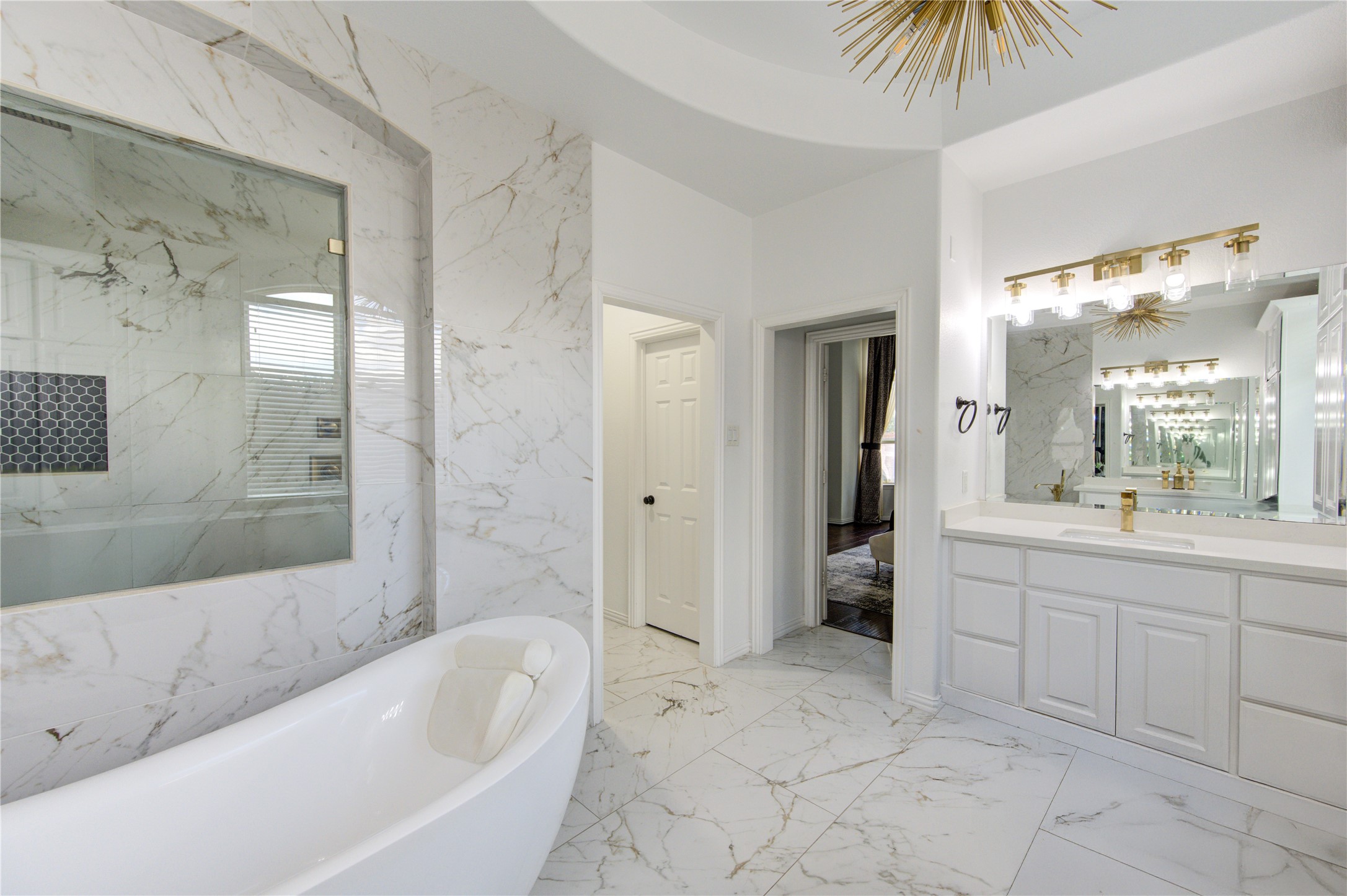 17539 Hankar Way Richmond, TX 77407 - Photo 19 of 34 a bathroom with a bathtub and a sink
