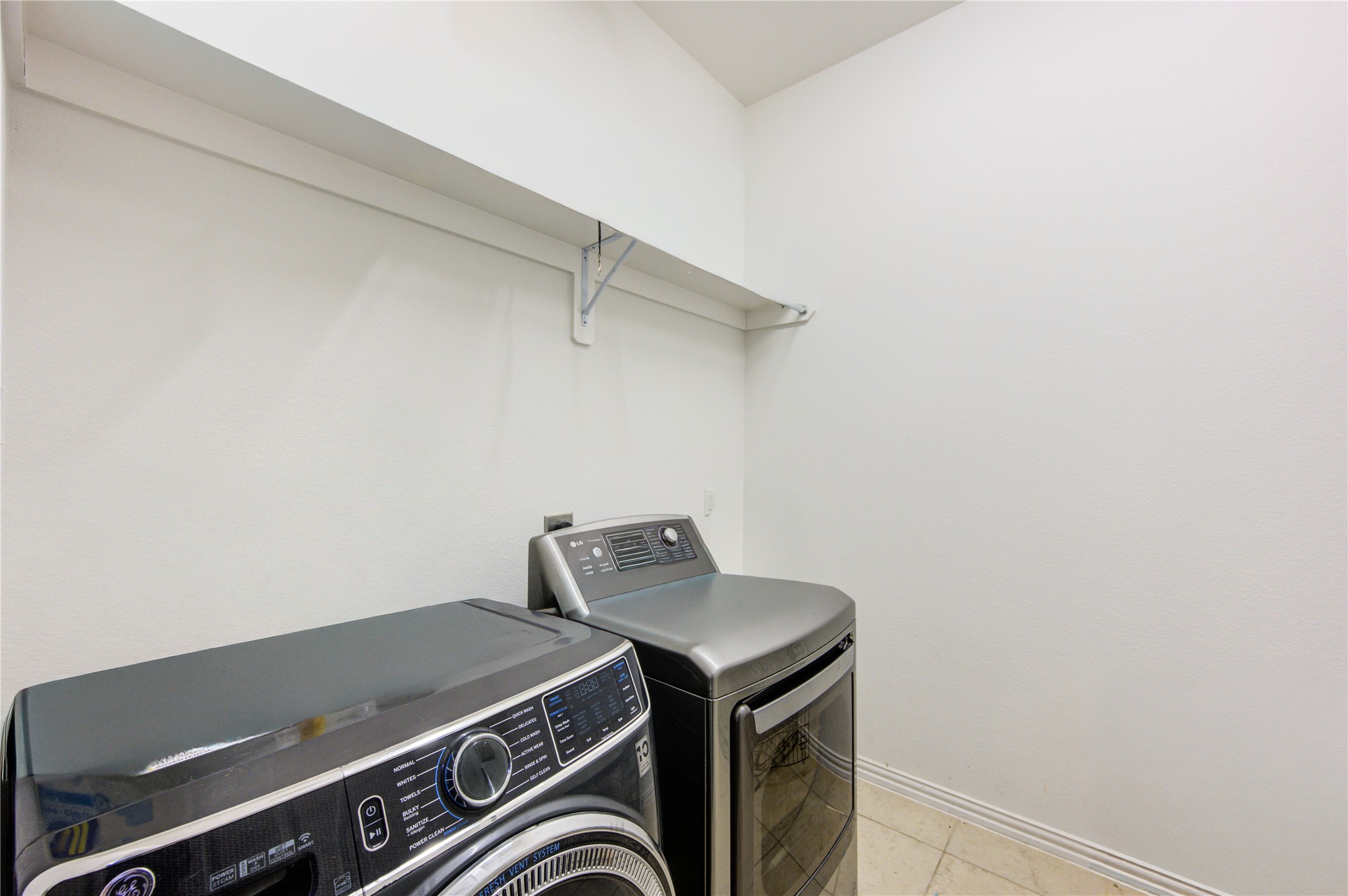 17539 Hankar Way Richmond, TX 77407 - Photo 31 of 34 a room with storage and utility