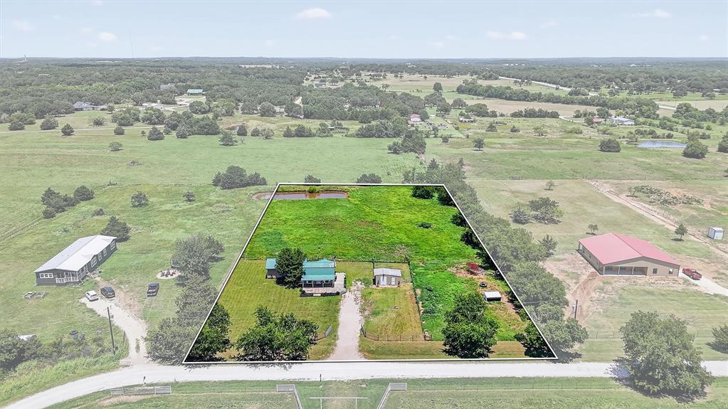 237 Mt Pleasant Road Valley View, TX 76272 - Photo 1 of 1 an aerial view of a houses with outdoor space
