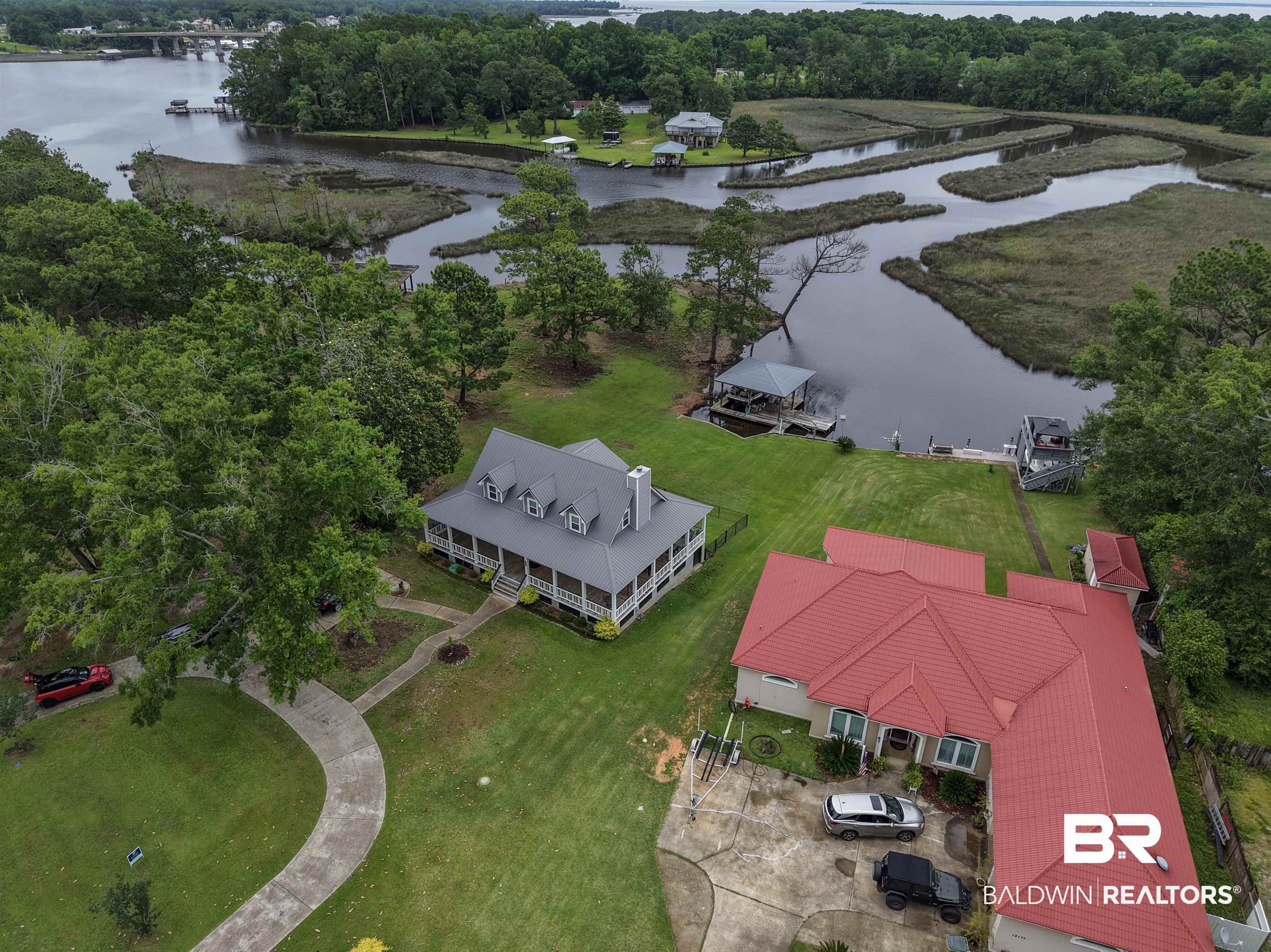 12171 Marguerite Drive Coden, AL 36523 - Photo 40 of 44 Expansive waterfront property featuring two distinct residences and private dock access