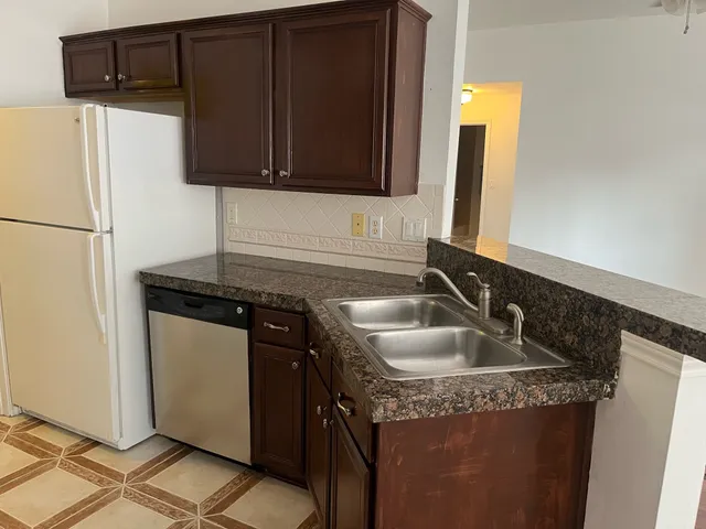 a bathroom with a tub and a shower