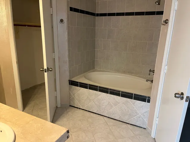 a bathroom with a bathtub