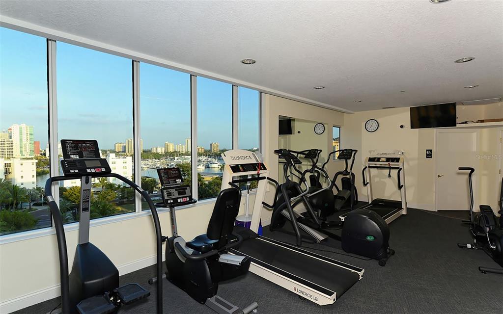 136 Golden Gate Point, Unit 502 Sarasota, FL 34236 - Photo 29 of 38 a view of a room with gym equipment