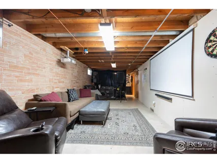 a living room with furniture a couch and a table